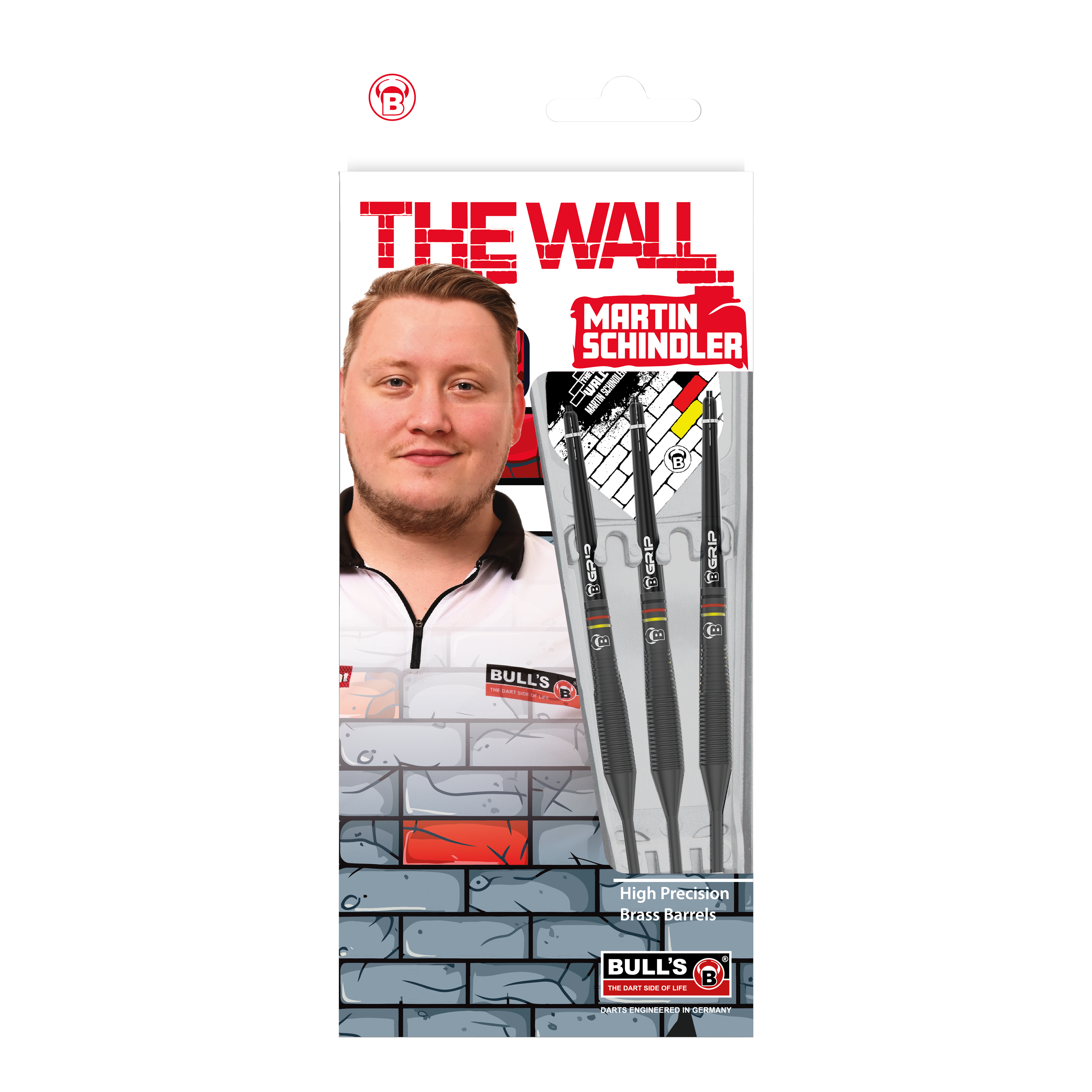 Bulls Martin Schindler The Wall Black Brass Steeldarts Auf dem Bild ist die Verpackung der "Bulls Martin Schindler The Wall Black Brass Steeldarts" zu sehen. Auf der Vorderseite sind das Produkt, ein Porträt von Martin Schindler und das Markenlogo abgebildet.