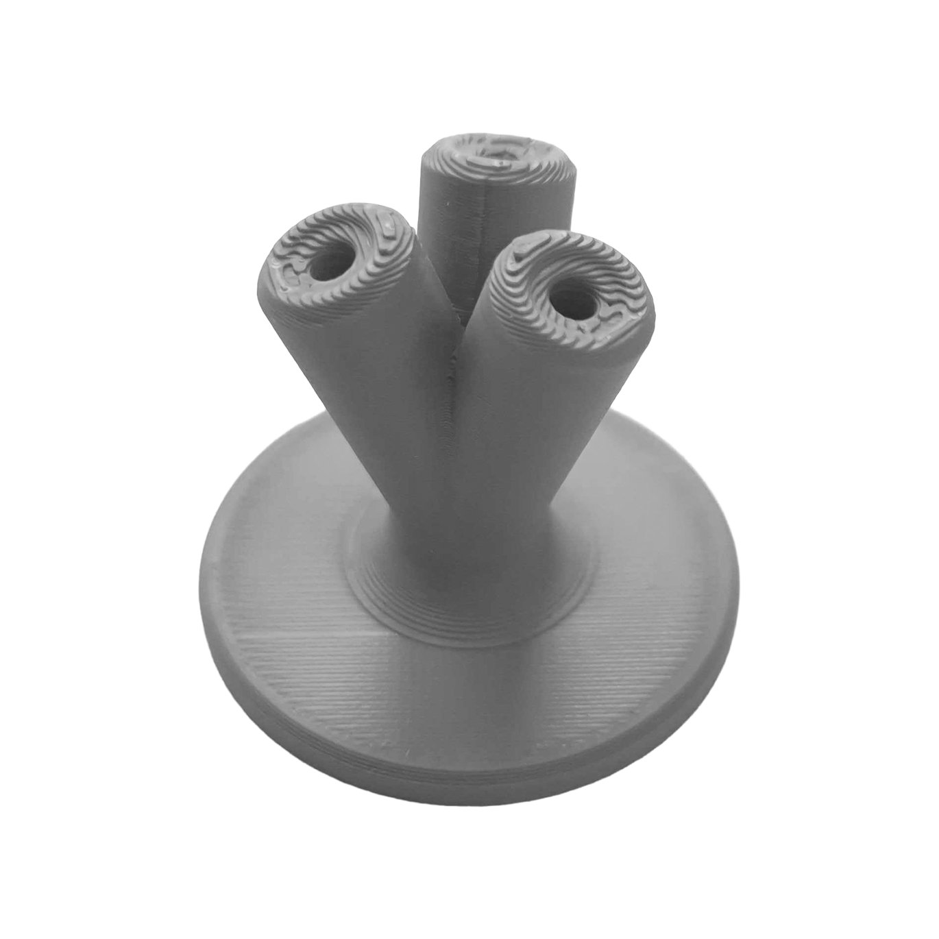 Hier sieht man einen kompakten Dart-Halter in Grau. Dieses Zubehör ist praktisch für die Aufbewahrung von Darts.