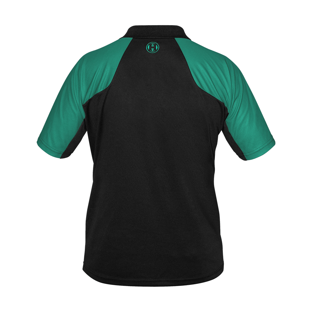 17577-Harrows-Vivid-Dartshirt-Black-Jade-2 Harrows Vivid Dartshirt Black/Jade liegt flach ausgebreitet. Das Shirt zeigt ein modernes Muster.