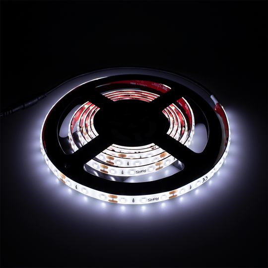 Target-Corona-Ersatzteil-LED-Band-2 Das Bild zeigt ein aufgewickeltes LED-Band, das leuchtet. Es handelt sich um das Produkt "Target CORONA Vision Ersatzteil LED-Band".