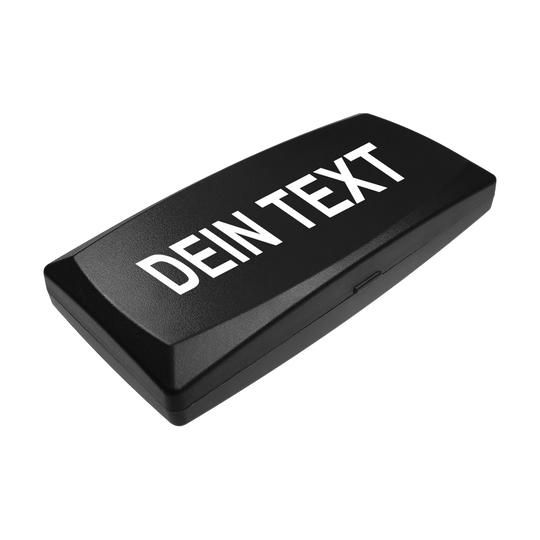 Dies ist eine schwarze rechteckige Box mit abgerundeten Kanten. Auf dem Deckel steht in weißen Großbuchstaben "DEIN TEXT".