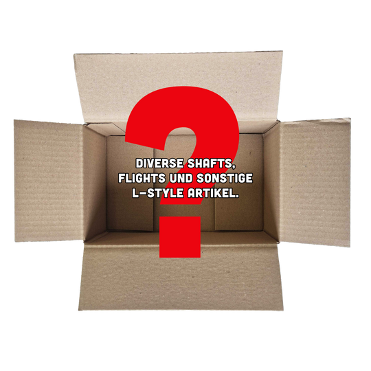 McDart Mystery Box - L-Style Das Bild zeigt einen offenen Karton mit einem großen roten Fragezeichen darin. In der Mitte steht der Text: "Diverse Shafts, Flights und sonstige L-Style Artikel."