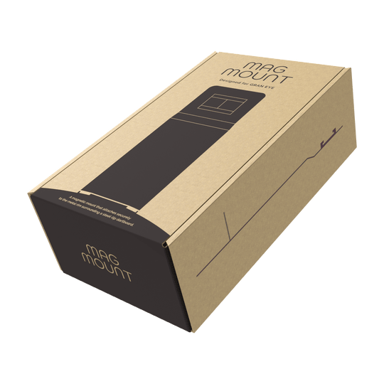 GranDarts Gran Eye Mag Mount attachment Die Abbildung zeigt eine Verpackung des Produkts "GranDarts GranEye Mag Mount Befestigung". Die Schachtel ist aus braunem Karton und trägt die Aufschrift "Mag Mount".
