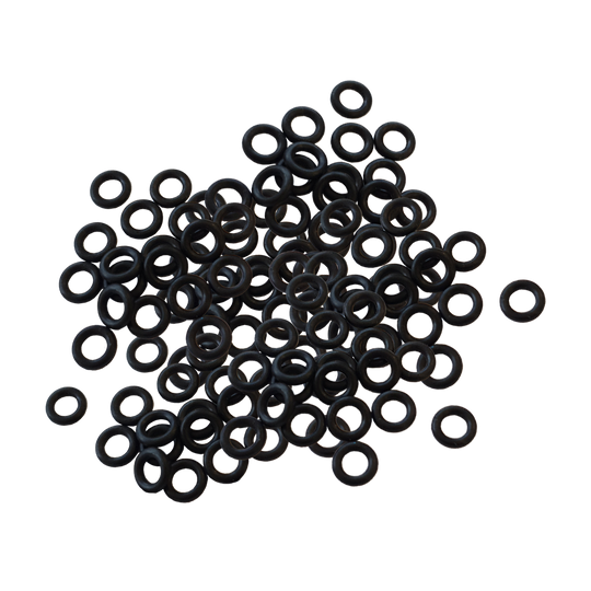 601Y_Shaftgummis_1000er_Set_1 Auf dem Bild sind viele kleine schwarze Gummiringe zu sehen. Es handelt sich um das Produkt "Shaftgummis (1000er Set)".