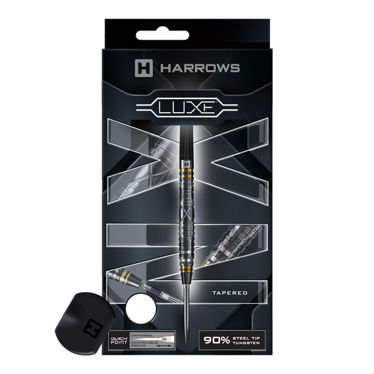 Harrows NX Luxe Tapered Quick Point Steeldarts Mehrere Steeldartpfeile mit zulaufender Form und feinem Profil sind zu sehen. Sie liegen nebeneinander auf einer hellen Fläche.