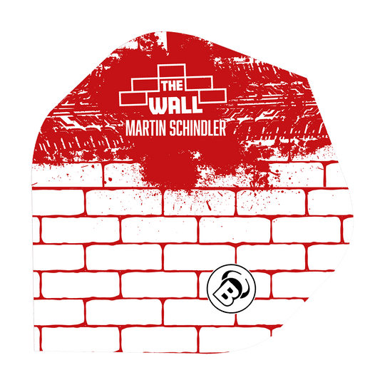 Das Bild zeigt ein Dart-Flight mit einem weißen Ziegelmuster und roten Farbspritzern. Oben steht „THE WALL MARTIN SCHINDLER“ und unten ist ein „B“-Logo abgebildet.