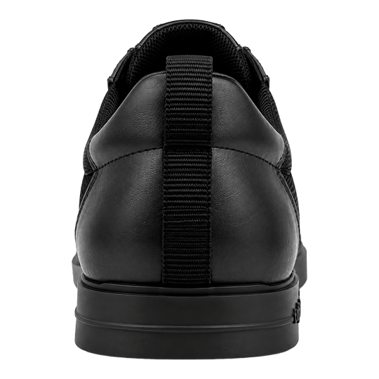 Triple20 Dart Shoes Textile with Twist Closure - Black Zu sehen sind die Triple20 Dartschuhe Textil mit Drehverschluss in schwarzer Farbe. Die Schuhe verfügen über einen speziellen Verschluss.