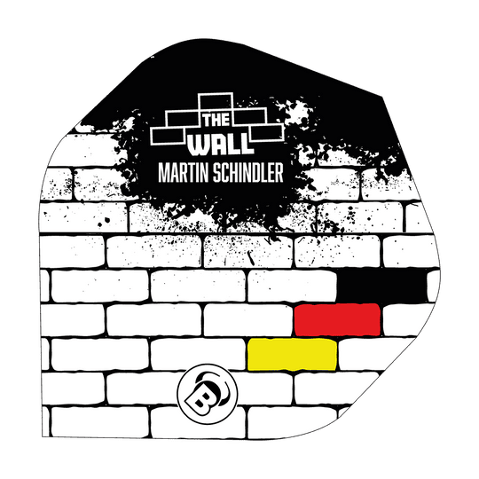Das Bild zeigt ein Dart Flight mit einem weißen Ziegelmuster und schwarzen, roten und gelben Farbfeldern. Oben steht der Schriftzug "THE WALL MARTIN SCHINDLER".